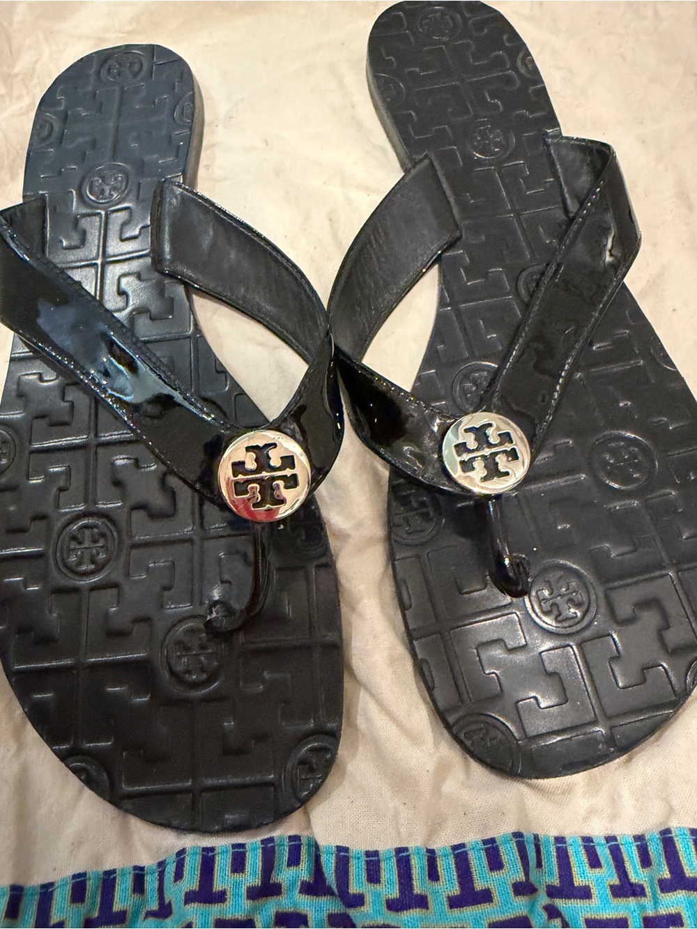 Tory Burch Black Patent Logo Thong Sandals with Gold Emblem